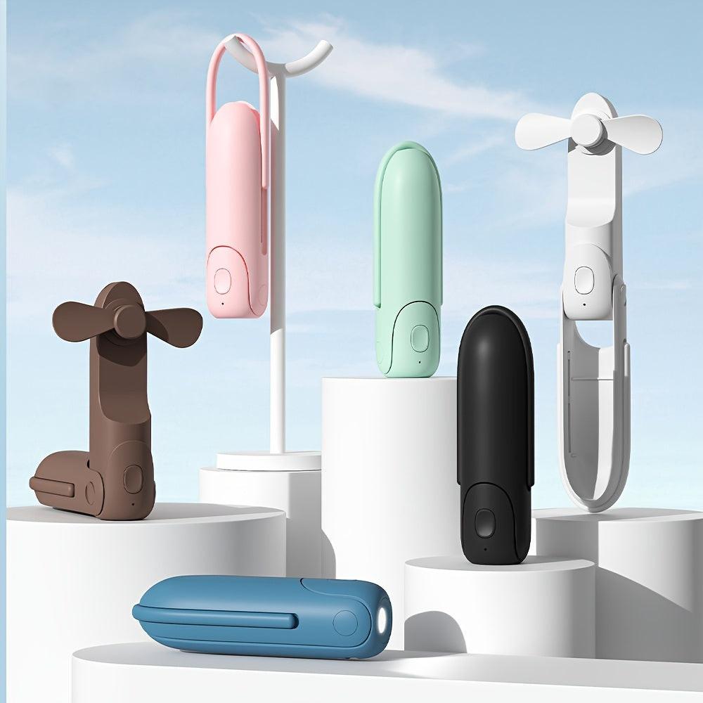 Compact And Portable Mini Fan That Folds, Featuring a High-Capacity, Extended Usage Time, Powerful Airflow, And Multifunctional Capabilities Including an Emergency Power Bank And Flashlight. Ideal for Outdoor Activities, Camp - Buy online at  Vibe In Cart.