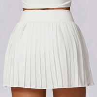 VITALINOVO Women's High Waisted Pleated Tennis Skirts with Pockets Tummy Control Casual Liner Skorts A Line Workout Golf Skirts - Buy online at  Vibe In Cart.