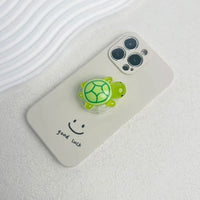 Luminous Plastic Turtle Phone Holder With Expanding Stand And Finger Grip