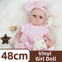 Full Body Vinyl Girl Rebirth Doll with Visible Blood Vessels and Pink Dress