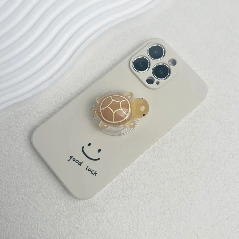 Luminous Plastic Turtle Phone Holder With Expanding Stand And Finger Grip
