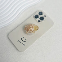 Luminous Plastic Turtle Phone Holder With Expanding Stand And Finger Grip