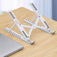 [Foldable Laptop Stand] Portable, Foldable, Ventilated ABS Plastic Adjustable Laptop Stand | Sturdy Design with Anti-Slip Pads, Lightweight and Easy to Clean, Durable Laptop Cooling Stand - Buy online at  Vibe In Cart.