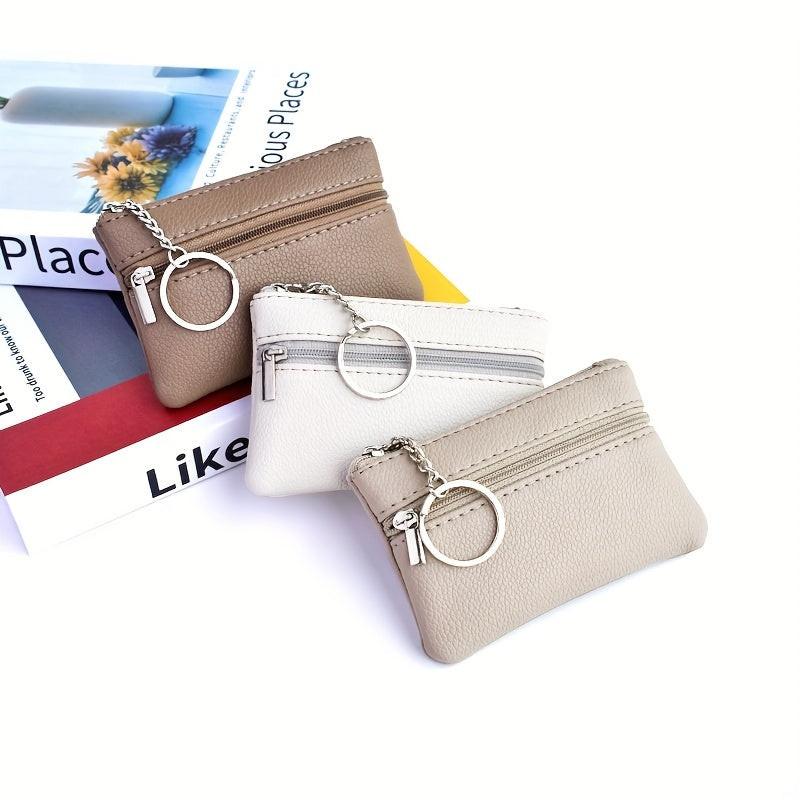 A Small Wallet with a Keychain That Holds Coins in a Mini Coin Purse. - Buy online at  Vibe In Cart.